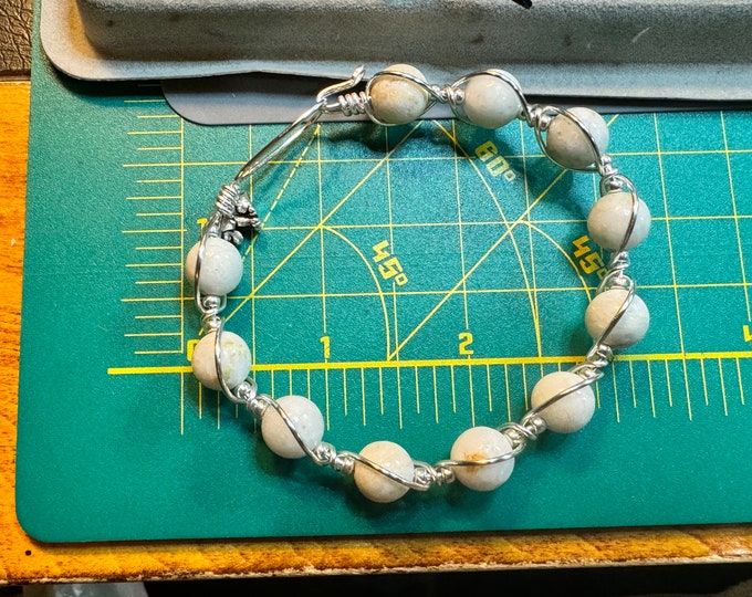 Fidget bracelet-Silver wire-wrapped bracelet with 8 mm white beads. White beaded jewelry with hook and eye closure. Handcrafted bracelet.