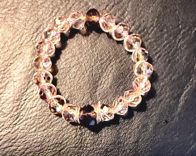 Circular beaded ring with wire wrap. Size 10