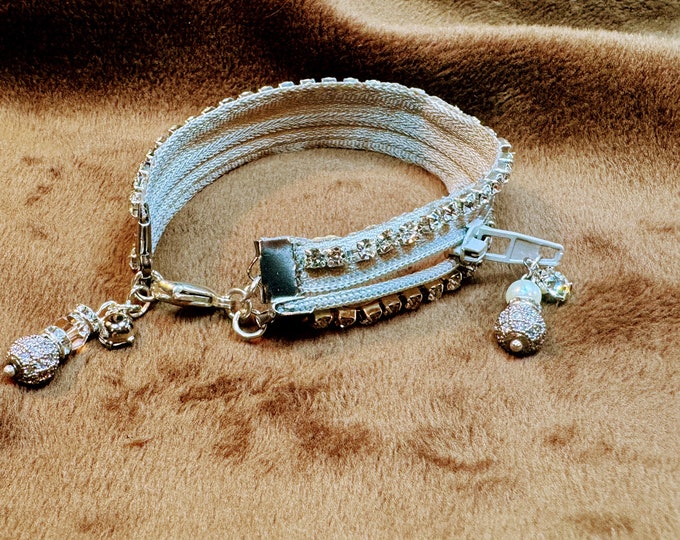 Gray zipper bracelet with lots of bling, rhinestones, crystals and shiny balls of silver. A refined gift just for her. 8” sized. Handmade