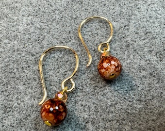 Gifts-French hook ear wires upon which has a single drop 6mm glass bead of bronze.  Handcrafted ear wires.