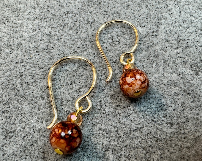 Gifts-French hook ear wires upon which has a single drop 6mm glass bead of bronze.  Handcrafted ear wires.