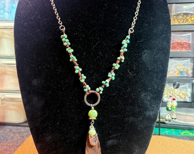 A 24” necklace-glass beads-gold spacers- beads-turquoise and gold faceted beads-magnetic closure-extended chain