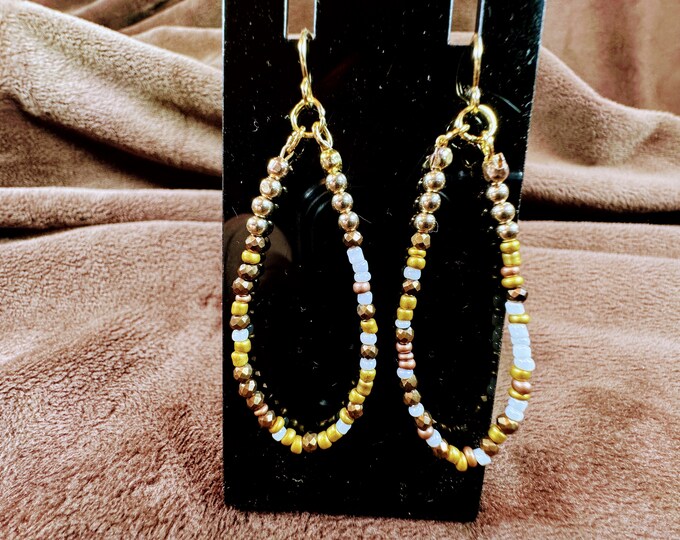 Copper wired round shaped hoop earrings-copper, red and gold beads-