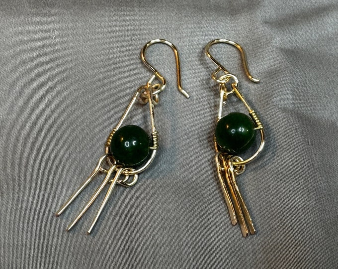 Gold wired oval-shaped hoop earrings-green wire wrapped bead-Fish hook. 1 1/2”