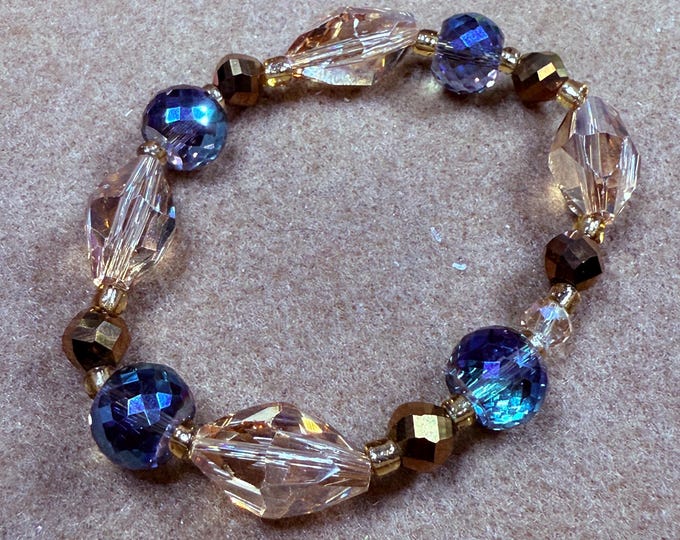 Bling crystal bracelet-blue and amber crystal bracelet-size 8-elastic stretch crystal bracelet with a cute charm.