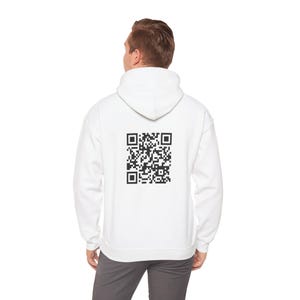 May include: White hooded sweatshirt with a black and white QR code printed on the back.