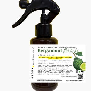 May include: A brown plastic spray bottle with a black trigger nozzle. The white label reads Room + Linen Spray Bergamont Matcha, 4 fl oz | 118 ml, Alcohol-Free, Phthalate-Free, Premium Fragrance Blend, and lists ingredients, usage instructions, and manufacturer info.