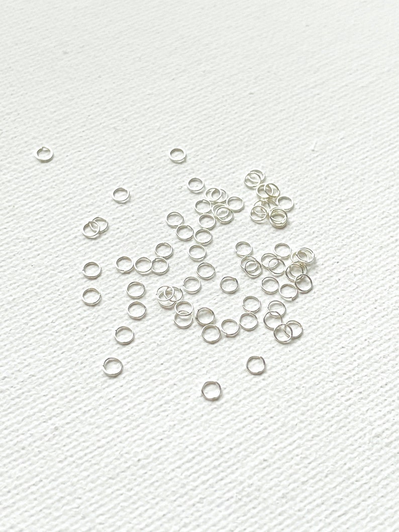 Extra Dünne Versilberte Edelstahl Ösen 3mm x 0.3mm / 100Stk Bild 2