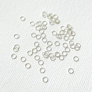 Extra Dünne Versilberte Edelstahl Ösen 3mm x 0.3mm / 100Stk Bild 1