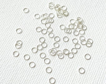Anello di salto aperto extra sottile in acciaio inossidabile placcato argento 3 mm x 0,3 mm / 100 pezzi