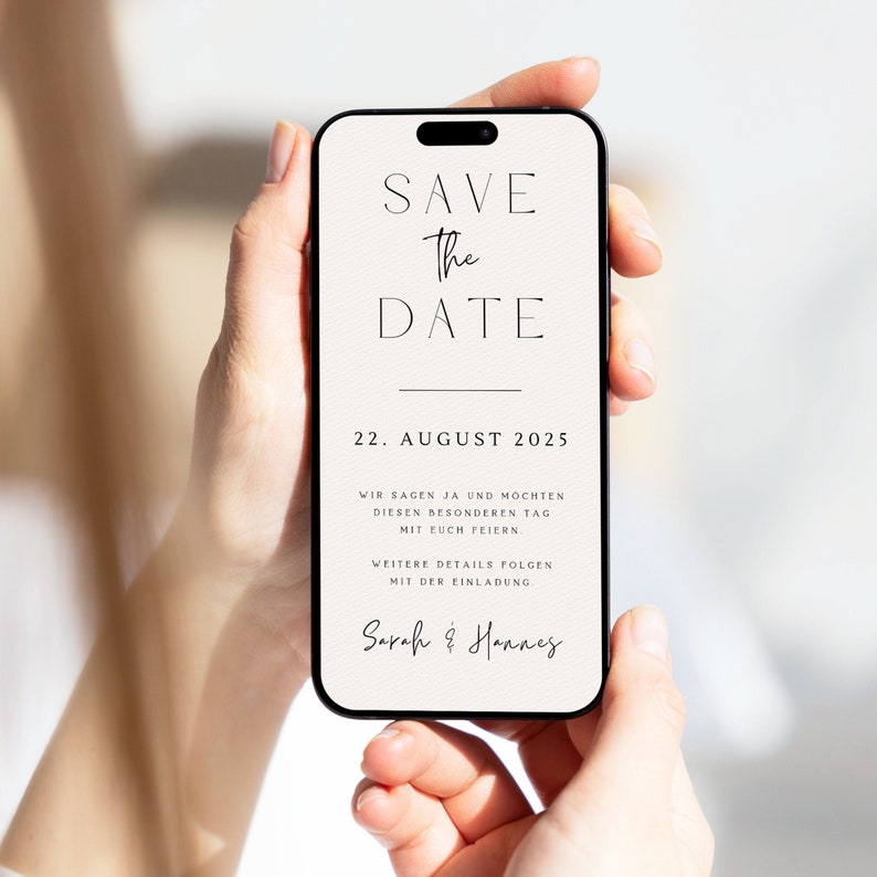 May include: A white save the date card with black text. The card says "Save the Date" with a line under it. The date is August 22, 2025. The text below the date says "Wir sagen ja und m&ouml;chten diesen besonderen Tag mit euch feiern. Weitere Details folgen mit der Einladung. Sarah & Hannes".