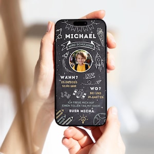May include: A smartphone screen showing a chalkboard-style invitation for a child named Michael, starting school. The invitation includes the date, time, and location, with drawings of rockets, pencils, and a sun.