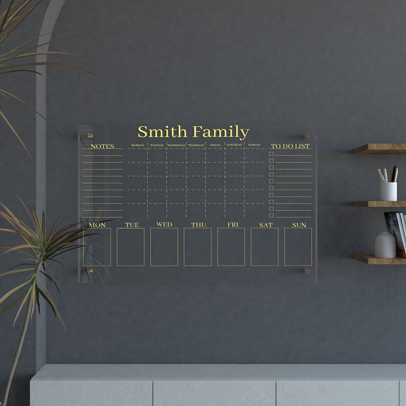 Minimalist acrylic wall planner for family organization at home
