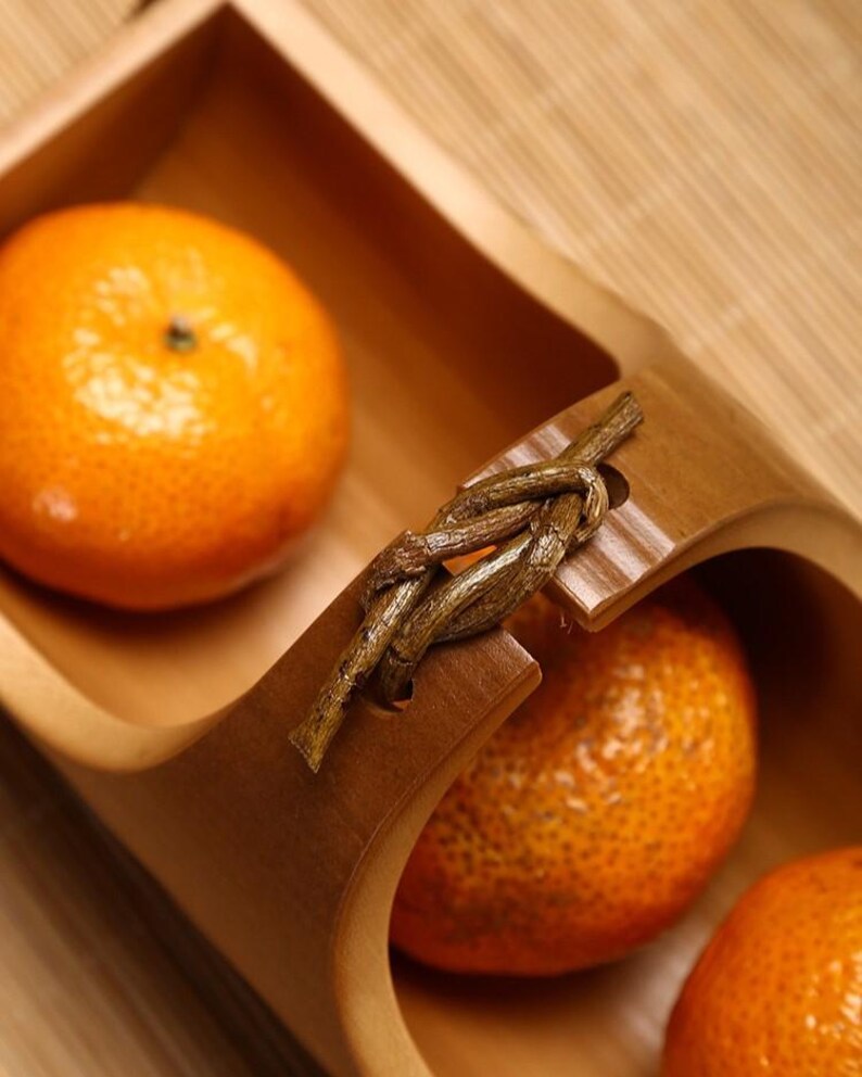 Elevate your dining experience with a Chinese bamboo plate, crafted sustainably and perfect for eco-friendly living. Ideal for serving or decor.