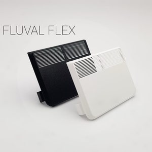 May include: Two Fluval Flex aquarium filter covers, one black and one white. Both covers are rectangular with a grid pattern.