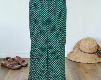 Pantaloni vintage anni '90 Nira Nira NY a gamba larga, taglia L, in raso, verde acqua, con elastico in vita.