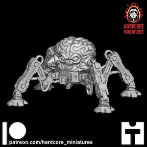 May include: A gray, 3D-printed miniature of a brain-shaped creature with mechanical legs and a menacing expression. The creature has a detailed, textured surface and is set against a black background. The text "patreon.com/hardcore_miniatures" is visible.