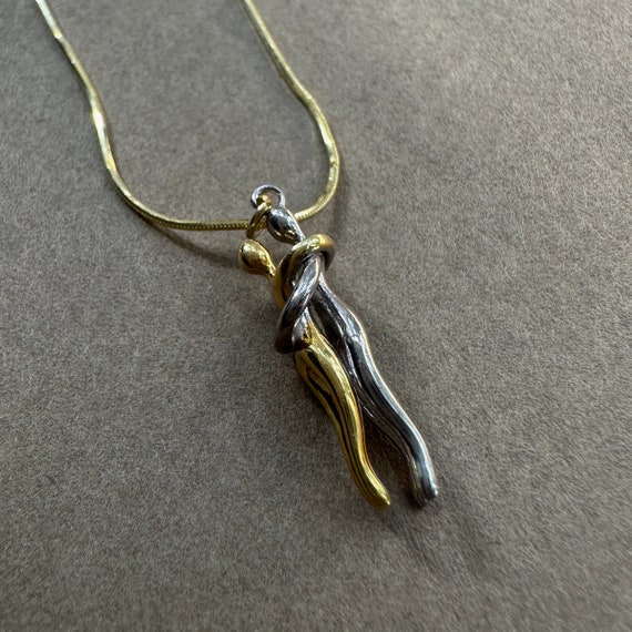 Couple hugging necklace discount