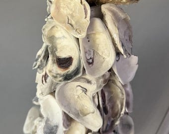 Árbol de conchas de ostras hecho a mano