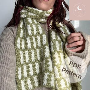 May include: A green and white striped knit scarf. The scarf is folded and draped around a person's neck. The image includes the text "PDF Pattern".