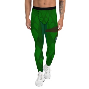 May include: Green and black patterned compression leggings with a geometric design. The leggings are worn by a person with white sneakers.