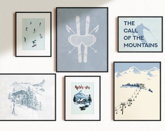 May include: A collection of six framed prints with a winter sports theme. The prints feature skiers, ski gear, a mountain scene, and the text "The Call of the Mountains".