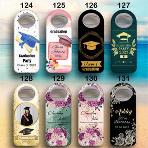 May include: A collection of graduation and birthday-themed bottle openers. Designs include graduation caps, floral arrangements, and personalized text such as "Olivia Johnson 2024" and "Ashley 60th Birthday 25.10.2025". The openers feature a metal bottle opener at the top.