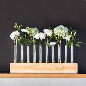 Centerpiece for all parties, flowers, holidays, and tables. Test tube vase with natural wood base. Perfect for tulips, dinner centerpiece...