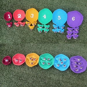 May include: A colorful educational toy set featuring six crocheted circles in red, orange, yellow, green, blue, and purple, each with a number from 1 to 6. Each circle has a corresponding number of small crocheted teddy bears.