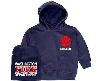 May include: Navy blue hooded sweatshirt with a red firefighter's cross and the text "MILLER" on the front. The back of the sweatshirt has the text "WASHINGTON FIRE DEPARTMENT" in white.