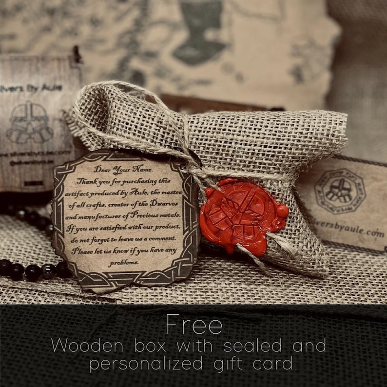 a wooden box with sealed and personalized gift cards