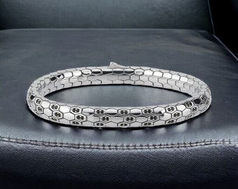 Elegante pulsera de pitón en plata de ley, joyería de lujo, regalo único hecho a mano para él, diseño de serpiente moderno, accesorio versátil para el verano.
