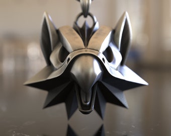 May include: A silver pendant necklace featuring a detailed wolf head design with a sharp, pointed snout and a fierce expression.