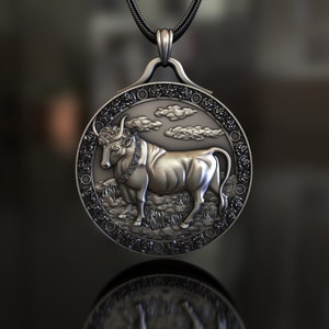 Wisiorek ze znakiem zodiaku Byk, srebro próby 925, ręcznie robiona biżuteria inspirowana astrologią, symbol stabilności i praktyczności dla obu płci, unikatowy egzemplarz