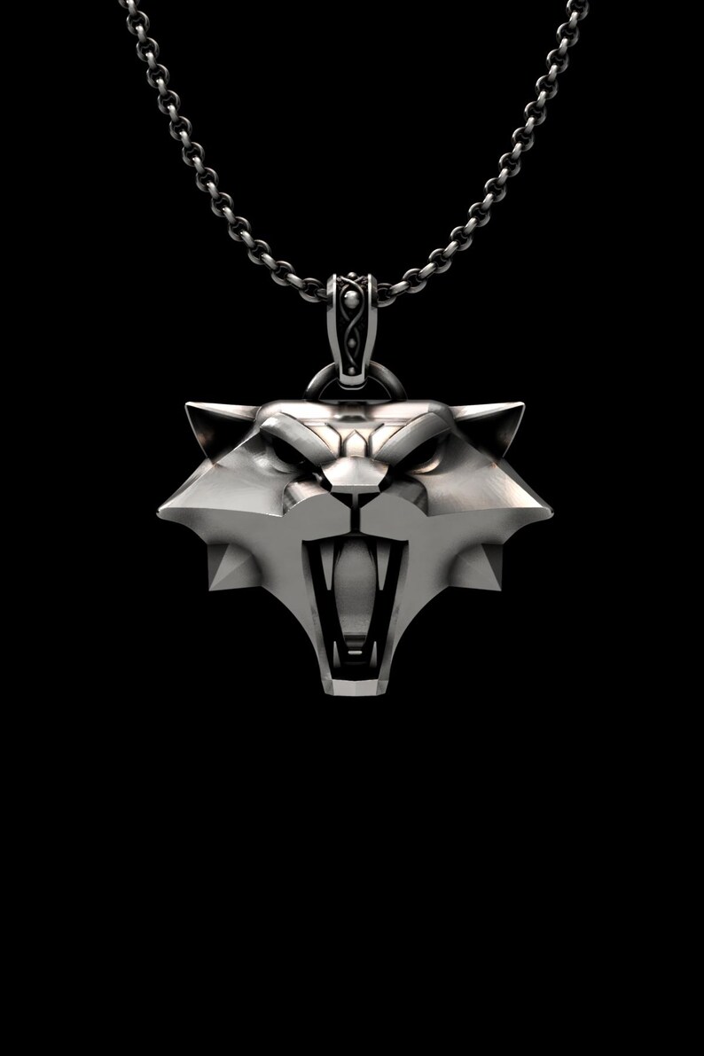 Back of witcher medallion showing SRN 1925 hallmark and honeycomb pattern