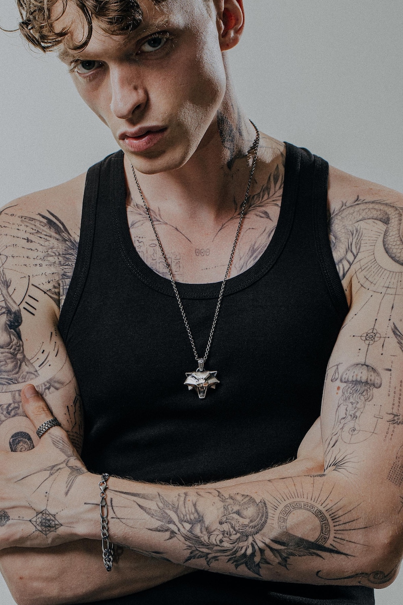 Sterling silver Cat School pendant with angular wolf face and fierce expression