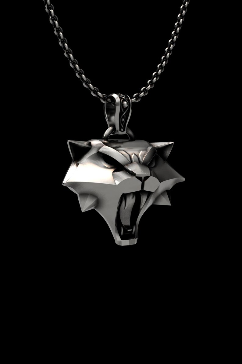 Side view of fantasy wolf medallion highlighting dimensional geometric cuts