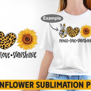 May include: Peace, Love, Sunshine sublimation design featuring a peace sign, heart, and sunflower with leopard print accents. The design is on a white t-shirt.