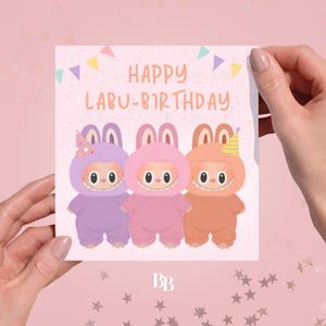 Cute Labubu Trending Toy TikTok Happy Birthday (14.5 x 15 cm) Greeting Card | For Her, Sister, Best Friend | Kids Teens Viral Pink Card