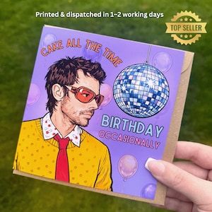May include: A birthday card with a purple background. The card features an illustration of a man wearing orange sunglasses, a yellow sweater, and a red tie. Text on the card reads "CAKE ALL THE TIME" and "BIRTHDAY OCCASIONALLY". A disco ball and balloons are also featured.