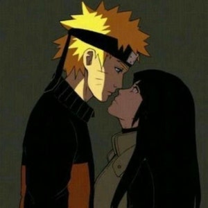 May include: A cartoon illustration of a man and a woman looking at each other. The man has blonde hair and is wearing a black and orange shirt. The woman has long black hair and is wearing a brown jacket.