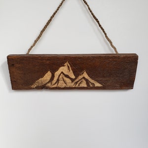 Hand engraved wooden mountain silhouette sign
