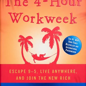 May include: A white ceramic mug with a black handle and the text "But First, Coffee" in a black, bold font. The mug is sitting on a white surface. The mug is approximately 4 inches tall.