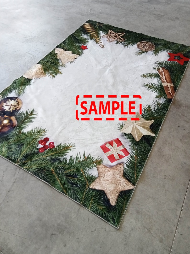 May include: Rectangular Christmas-themed rug with a white center and a border of green pine needles, ornaments, and festive decorations. The rug features gold stars, red berries, and a gift box. The word "SAMPLE" is printed on the rug.