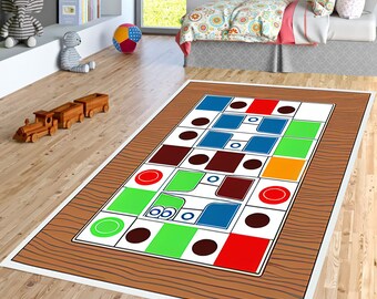 May include: A brown and white rug with a colorful game board design. The game board features squares, circles, and different colored shapes. The rug has a wood grain pattern.
