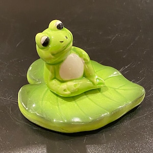 Vintage frog on lilypad