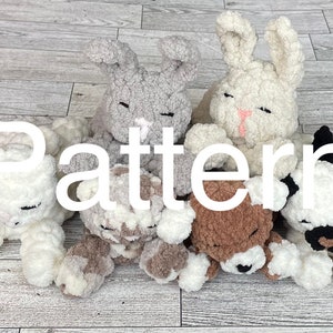 May include: A group of seven crocheted stuffed animals, including a bunny, a bear, and a dog, are lying on a light wood floor. The animals are all made with a fluffy yarn and have closed eyes. The word "Pattern" is written in white letters across the middle of the image.