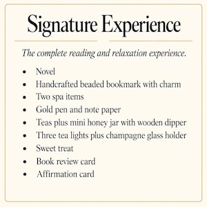 May include: A white informational card with black text titled Signature Experience. The list includes a novel, beaded bookmark, two spa items, gold pen, note paper, teas, mini honey jar with wooden dipper, three tea lights, champagne glass holder, sweet treat, book review card, and an affirmation card.