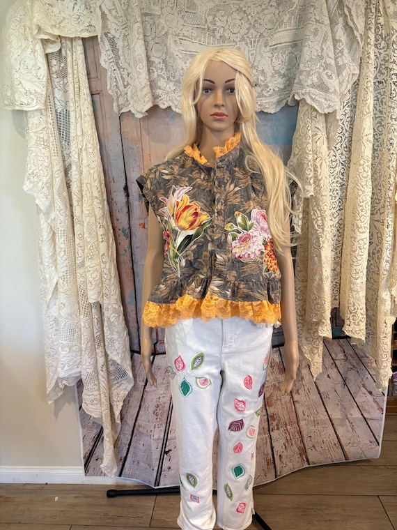 Great summer top! Recycled men's top, ruffles and appliqués added.