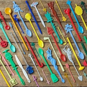 Vintage swizzle stick lot 25pc collection bar decor or party. Bright fun plastic souvenir drink stirrers for staging retro bar, man cave